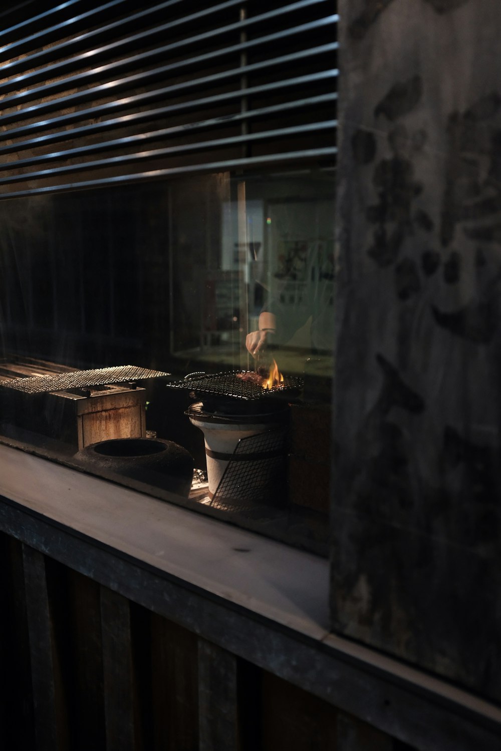 a window sill with a pot on top of it