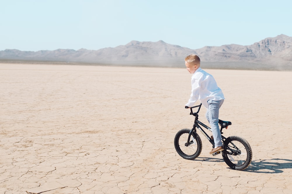 boy riding bicycle