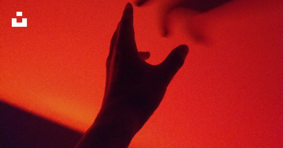 Shadowed Red Hand Person's hand with shadow photo – Free Red Image on Unsplash