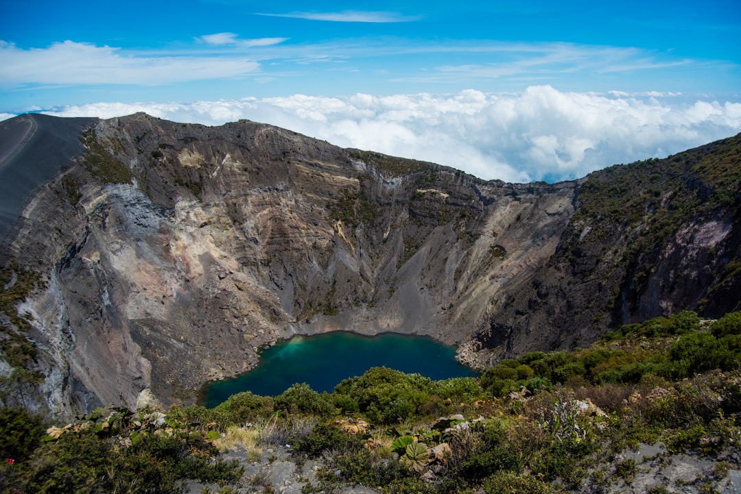 aerial photography of lake under blue sky