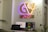 A bright, inviting workspace adorned with colorful decor and plants.