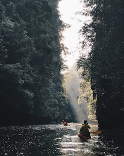person riding on kayak