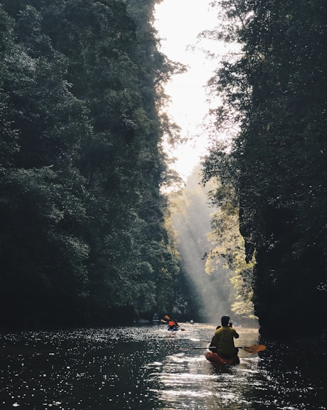 person riding on kayak