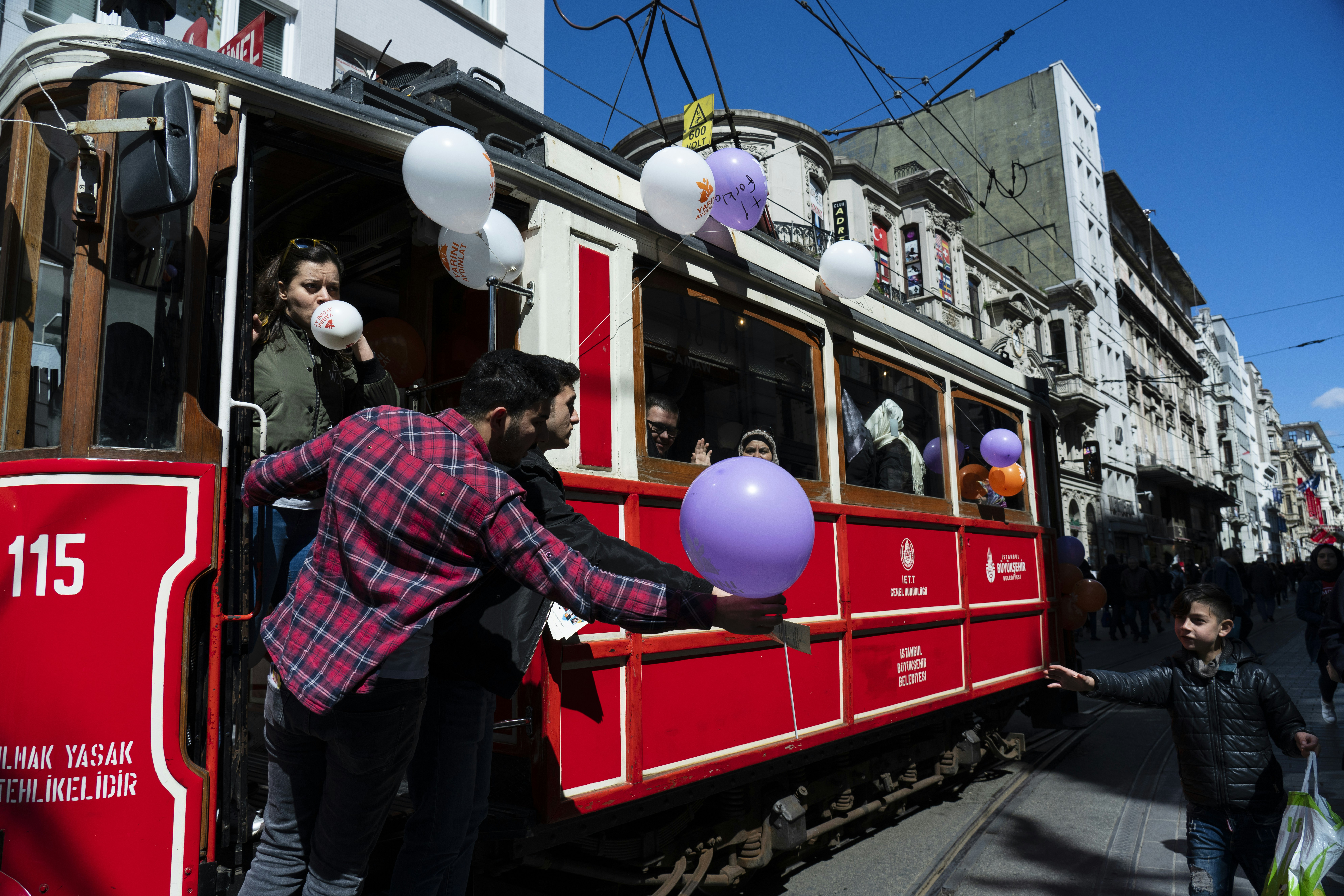 man standing outside bus