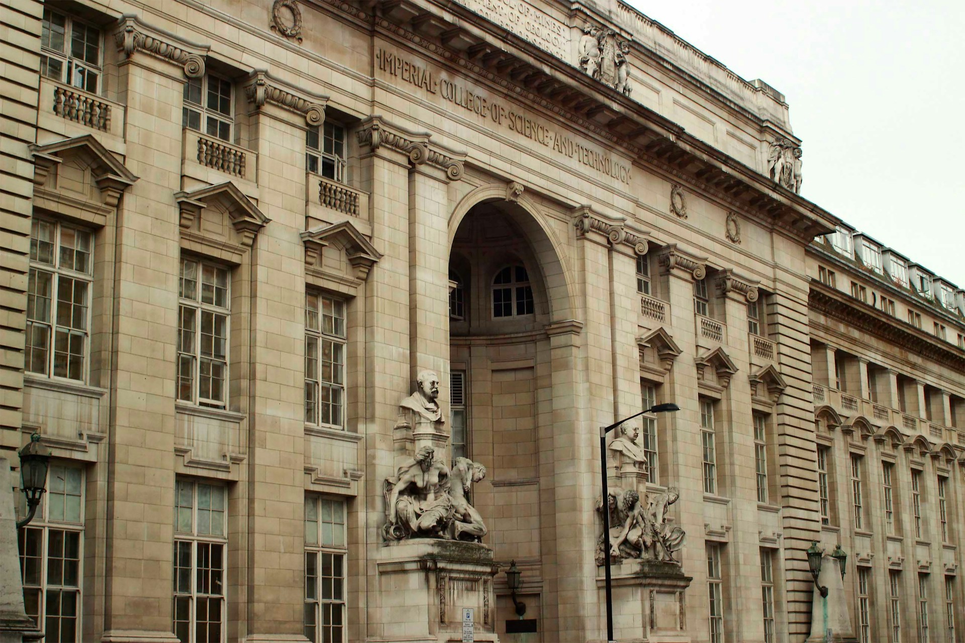 woman wearing yellow long-sleeved dress under white clouds and blue sky during daytime