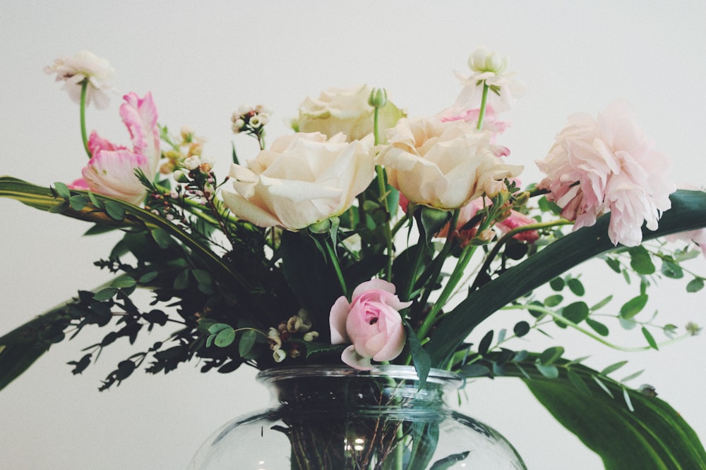 white and pink roses in vase