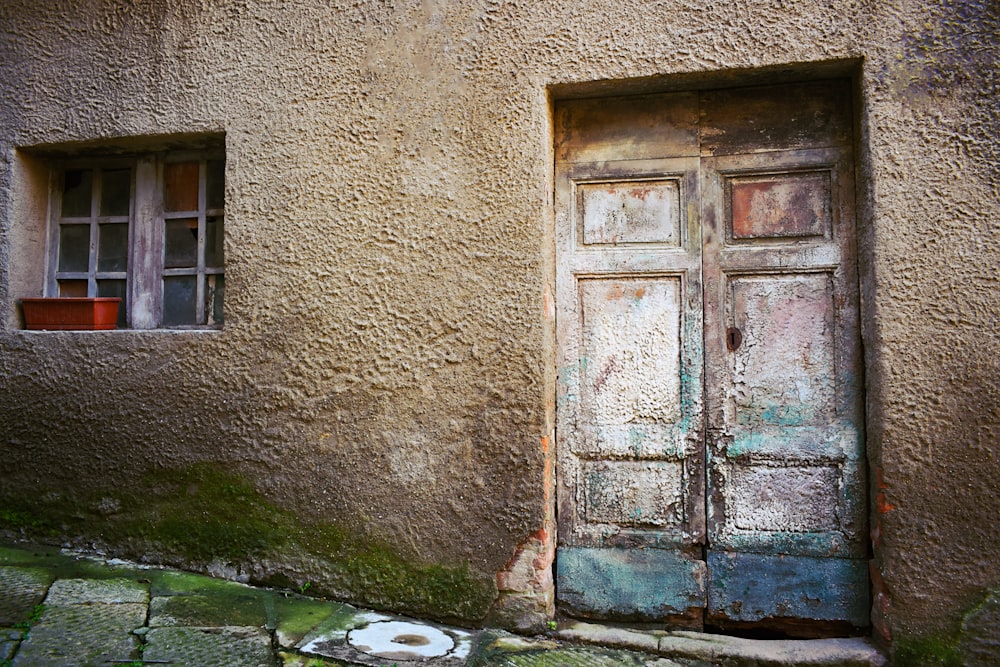 blue door near brown wall