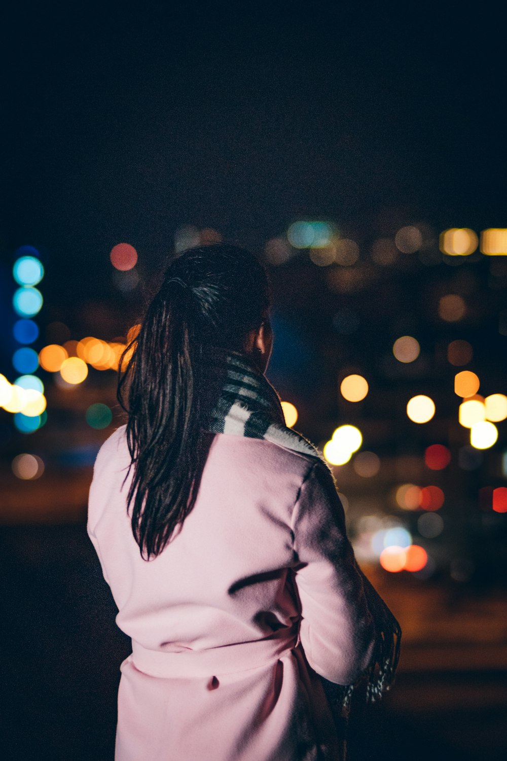 woman wearing pink coat