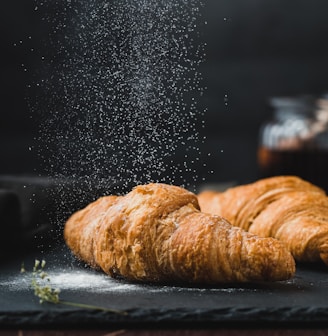 two brown croissants