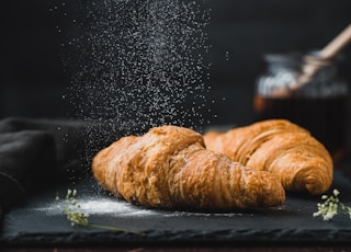 two brown croissants