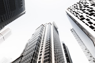 low angle photography of highrise buildings