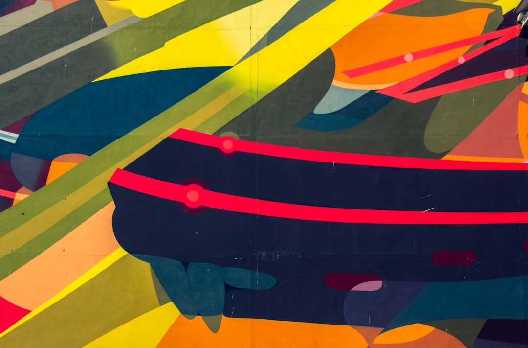 a painting of a boat on the side of a building,