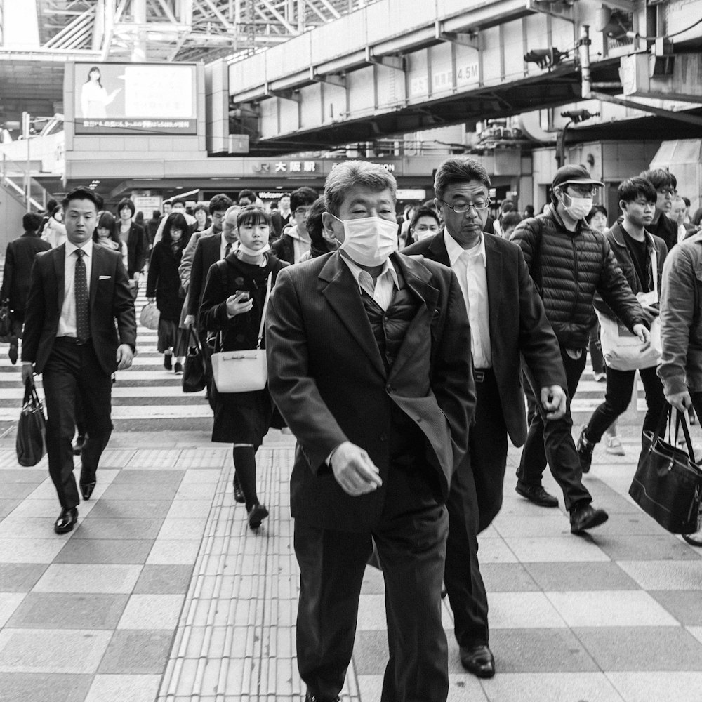 people walking on road during daytime