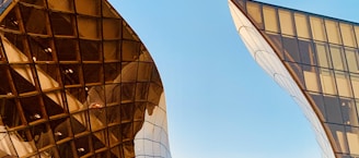 structural photography of amber glass building