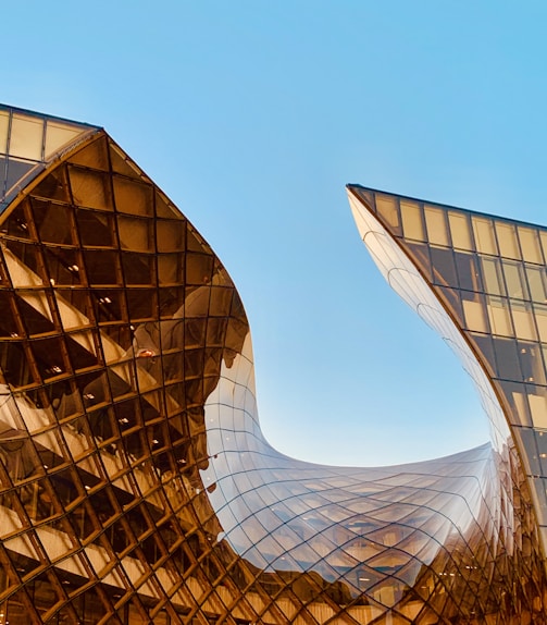 structural photography of amber glass building