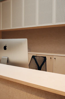 A modern office setup showcasing a sleek network installation with visible HP and Aruba equipment.