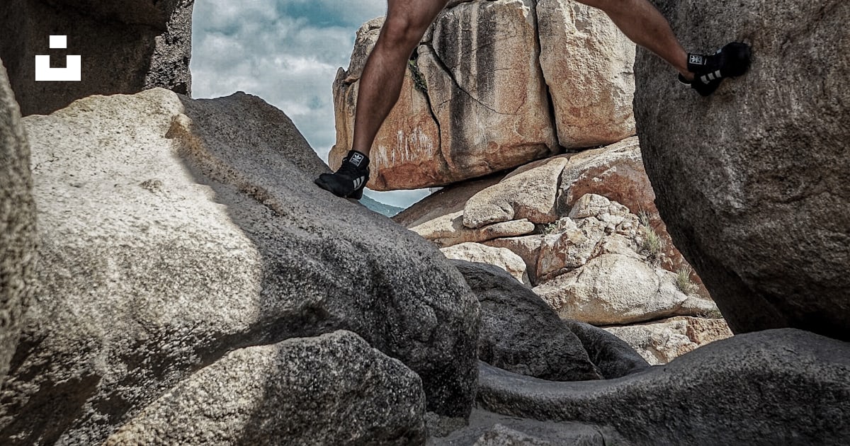 Man carrying rock photo – Free Human Image on Unsplash