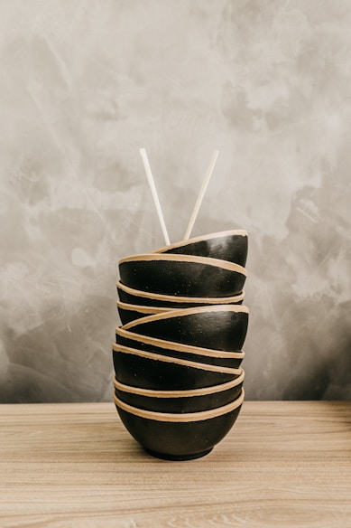 pile of black bowls