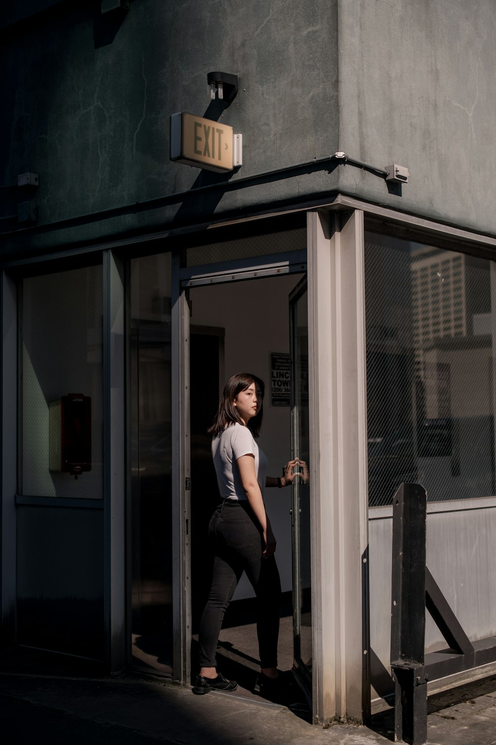 woman entering building