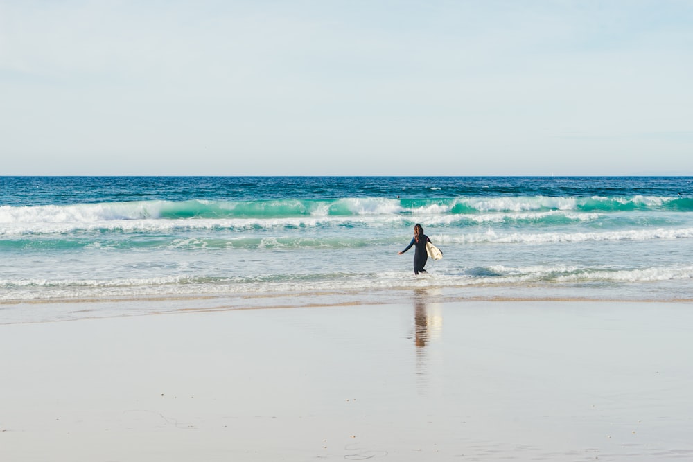 woman standing near ocean