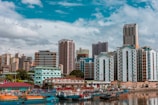 cityscape photography of buildings and boats
