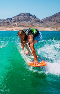 man surfing during daytime