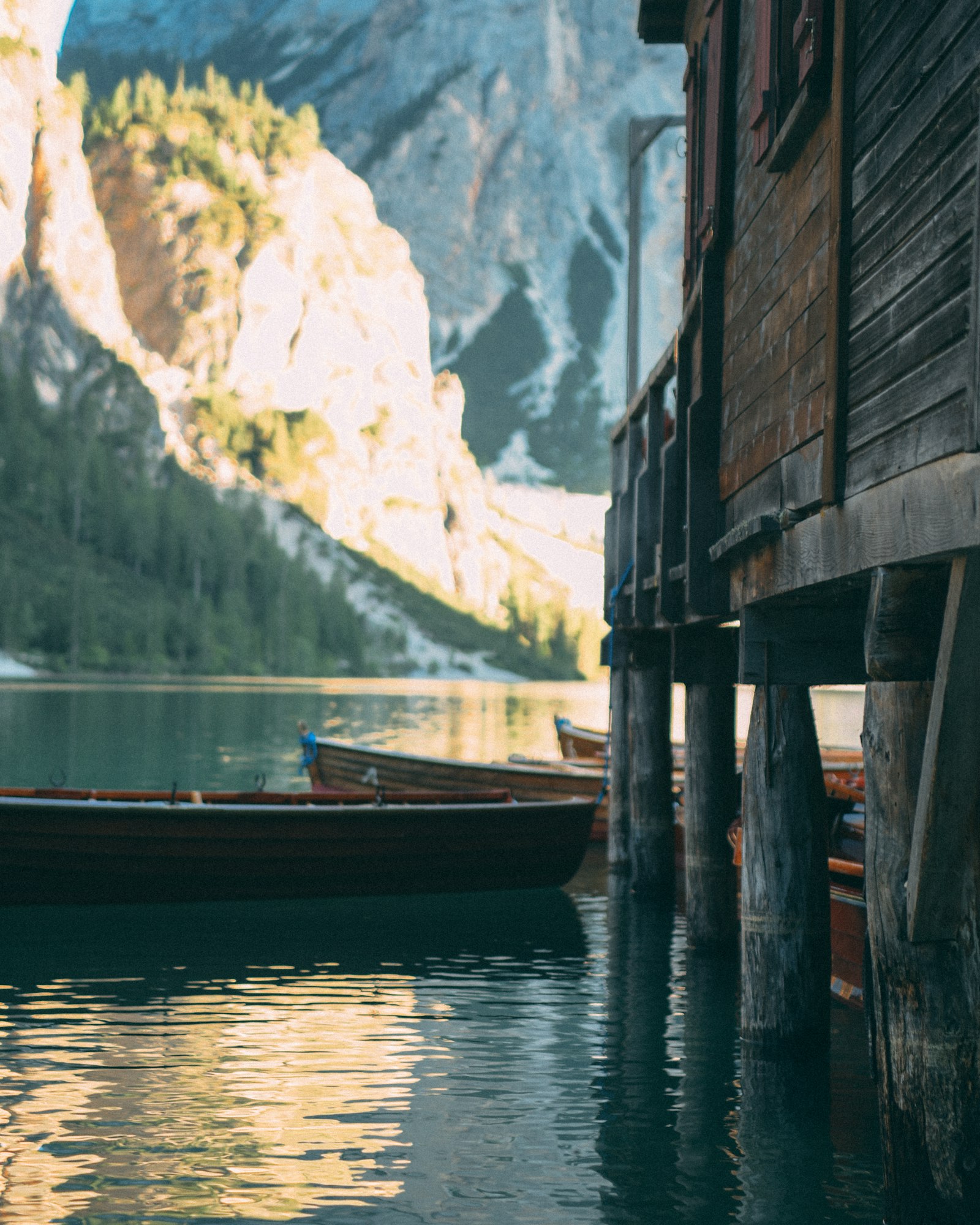 Nikon D750 + Sigma 24-70mm F2.8 EX DG Macro sample photo. Brown wooden boat beside photography