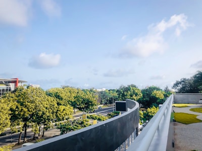 Wide roads and landscaped gardens at Godrej Riverhills.