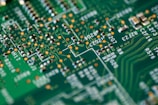 A close-up of a circuit board with various components.
