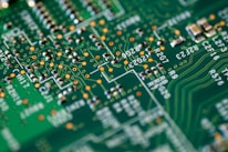 Close-up of a circuit board with intricate designs and components.