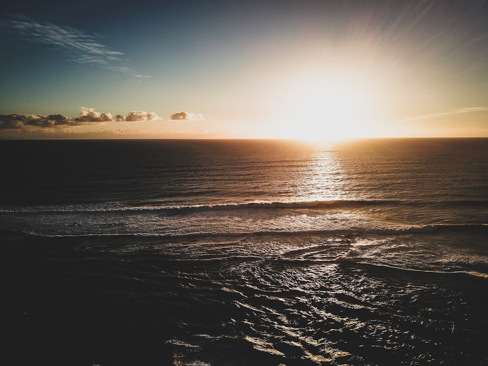 aerial photography of ocean during golden hour