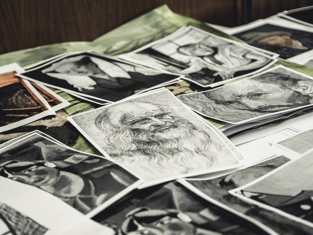 artist sketches scattered on the table