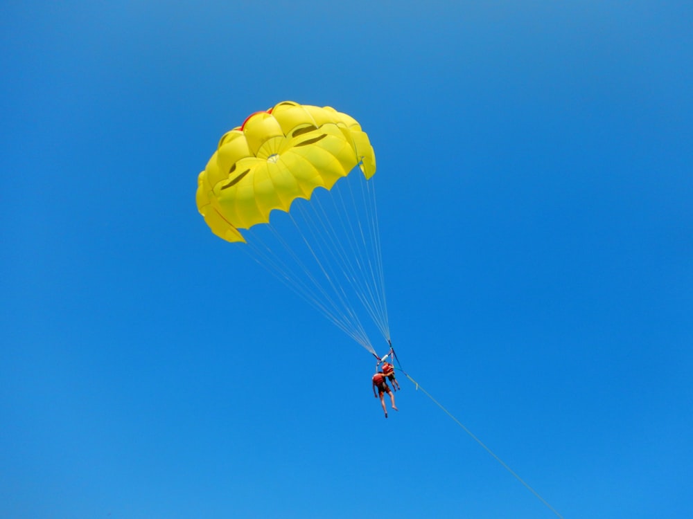 person riding parachute