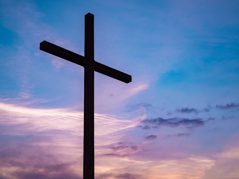 view of cross during golden hour