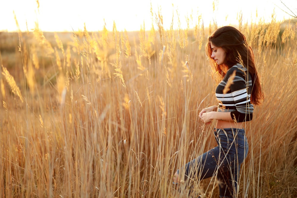 woman wearing black and grey stripe shirt