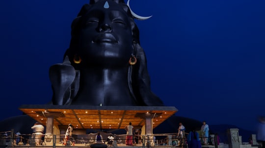 statue head temple at night in Coimbatore India