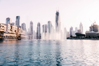 body of water near building during daytime