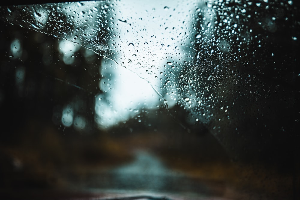 rain drops on the windshield of a car