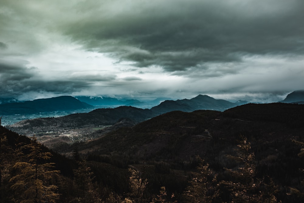 view of mountain under gray sky