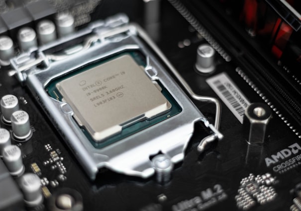 Intel processor on black motherboard