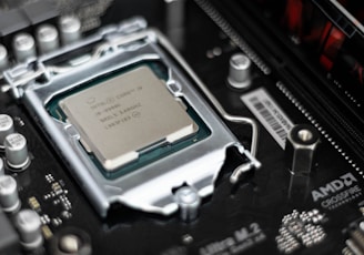 Intel processor on black motherboard