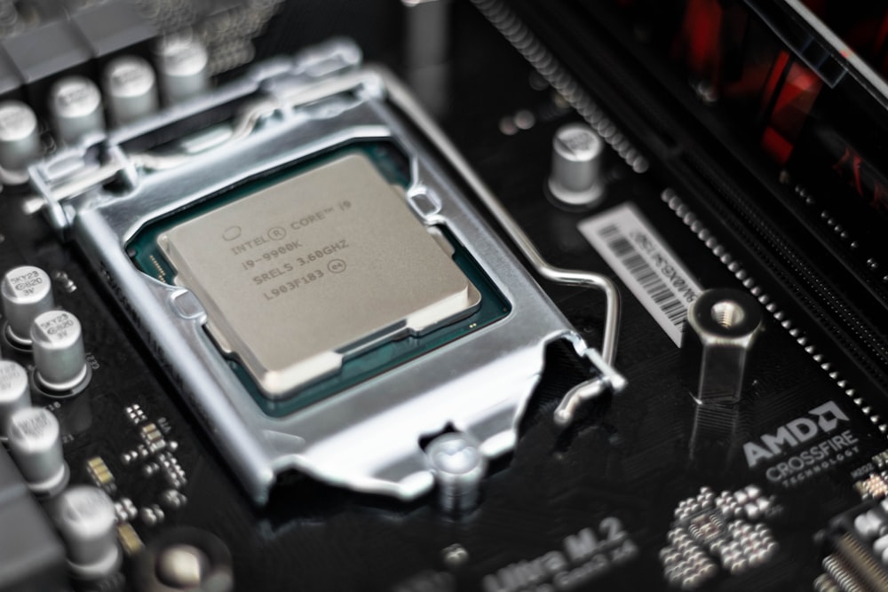 Intel processor on black motherboard