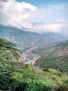 river flows between mountains