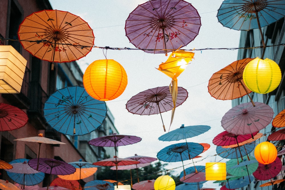 umbrellas hanging on wires