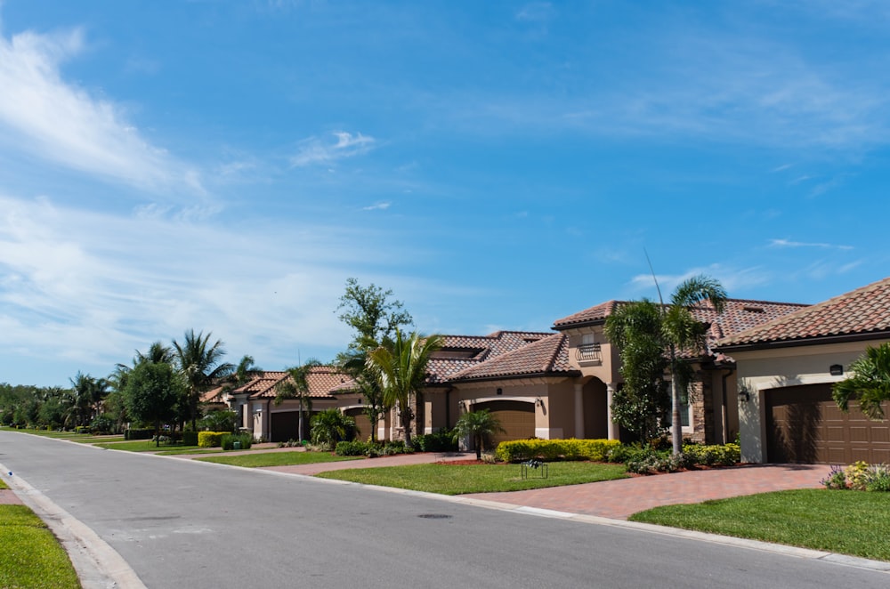 white and brown painted house residential - docrypto.com