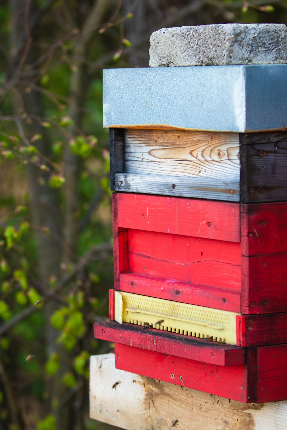 a beehive made out of wooden boards