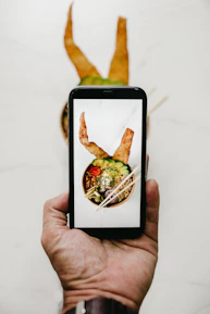 person holding black smartphone