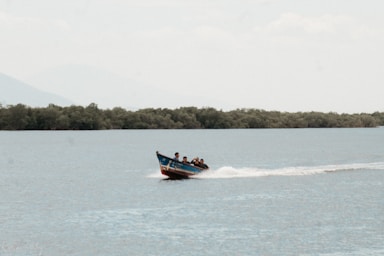 a boat with people on it is in the water