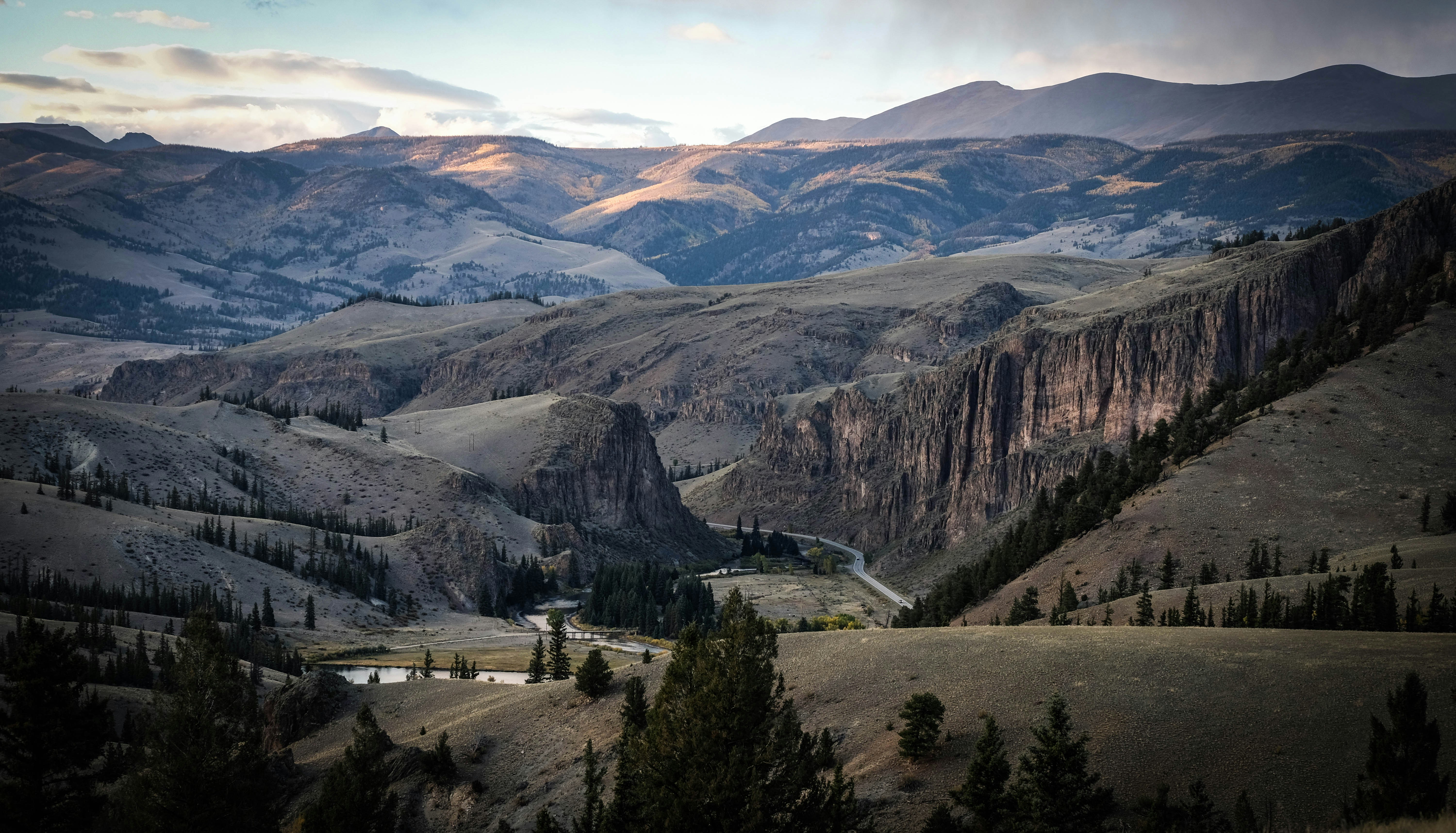 I spent the past summer working on the 4UR Ranch in southwest Colorado which provided me plenty of opportunity to capture some great shots. This particular picture looks down from the mountainside on the east side of the ranch. The Rio Grande River can be seen flowing past the entrance of the ranch as it winds its way through wagon wheel gap.