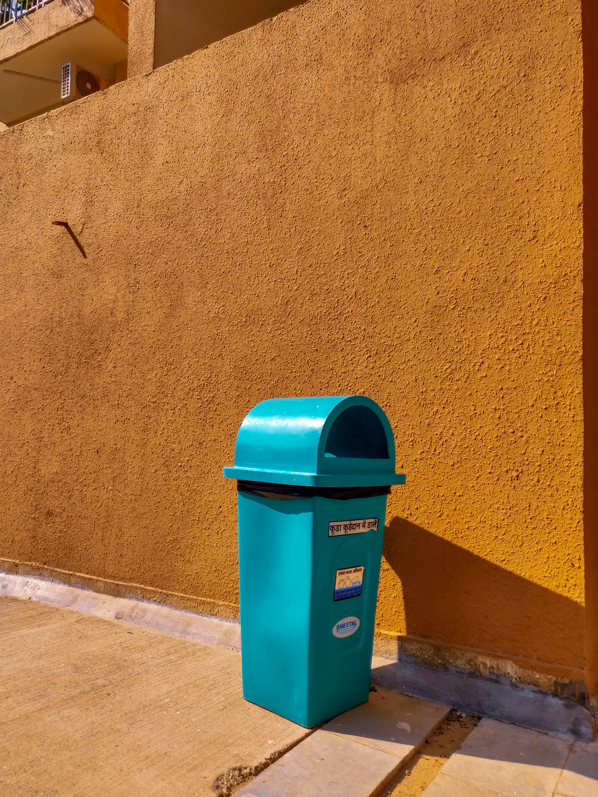 woman wearing yellow long-sleeved dress under white clouds and blue sky during daytime